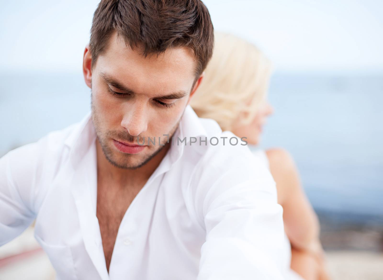 dating and relationships concept - stressed man with man outside