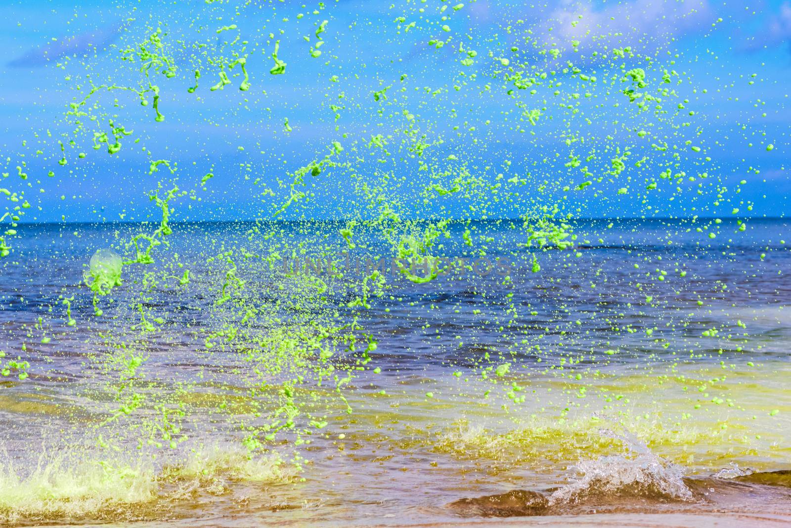 Green watercolour splash on sea background