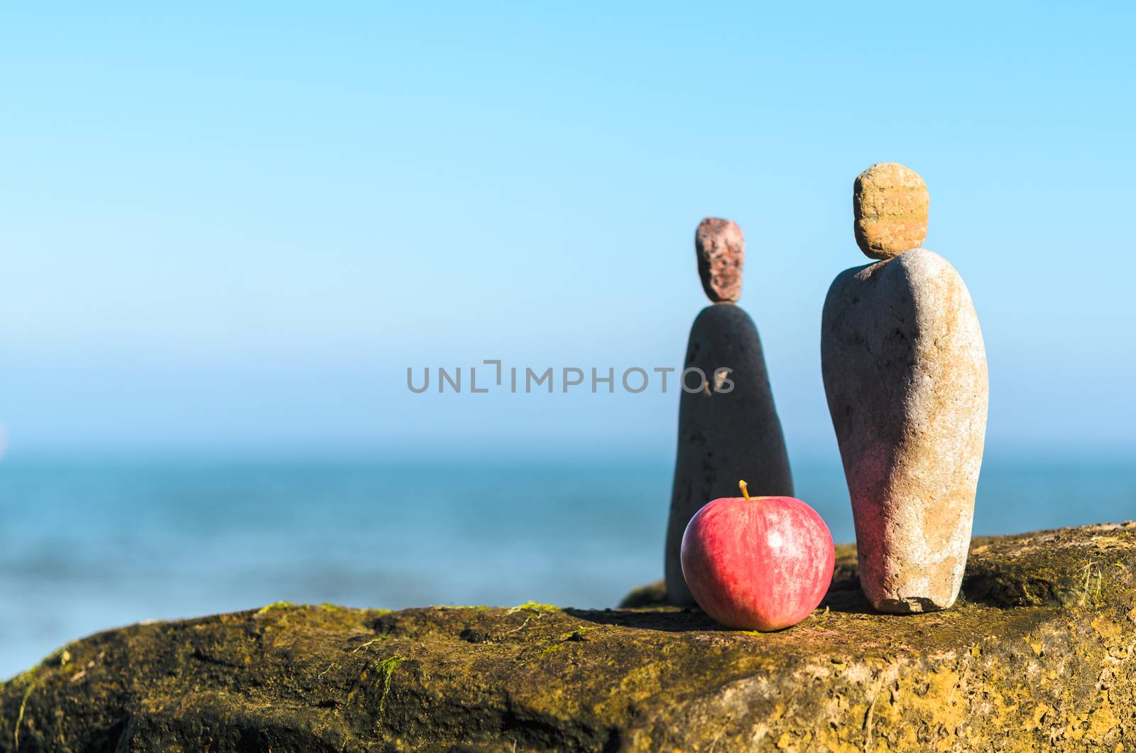 Figurines of man and woman of the stones at the sea