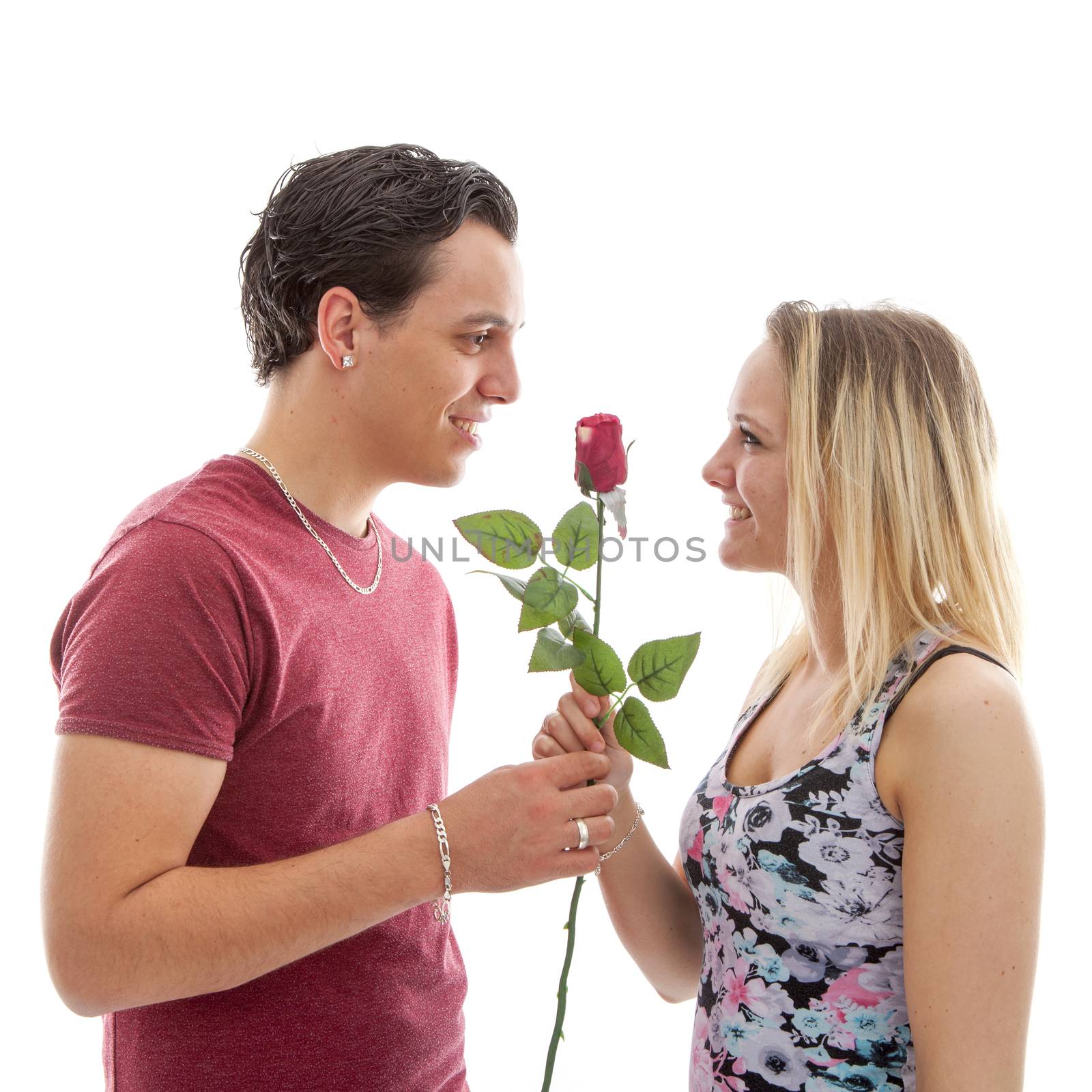 Girl is happy with rose giving by boyfriend over white background