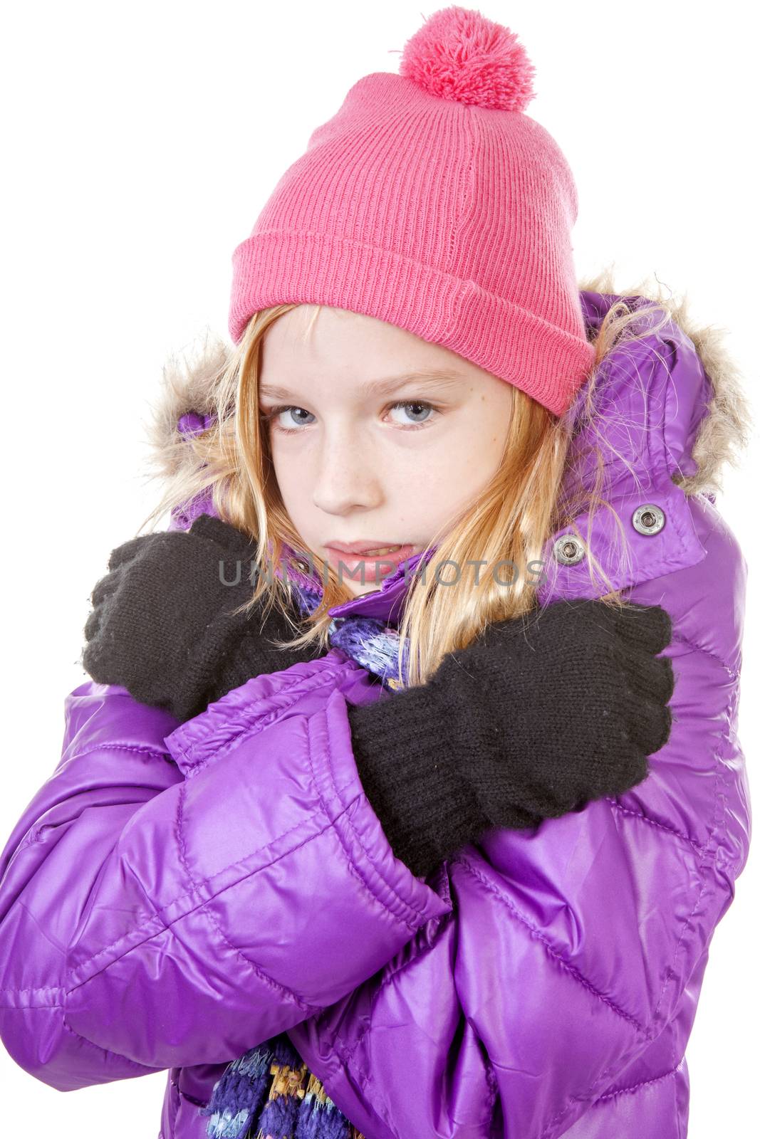 young girl in winter outfit heaving cold over white background