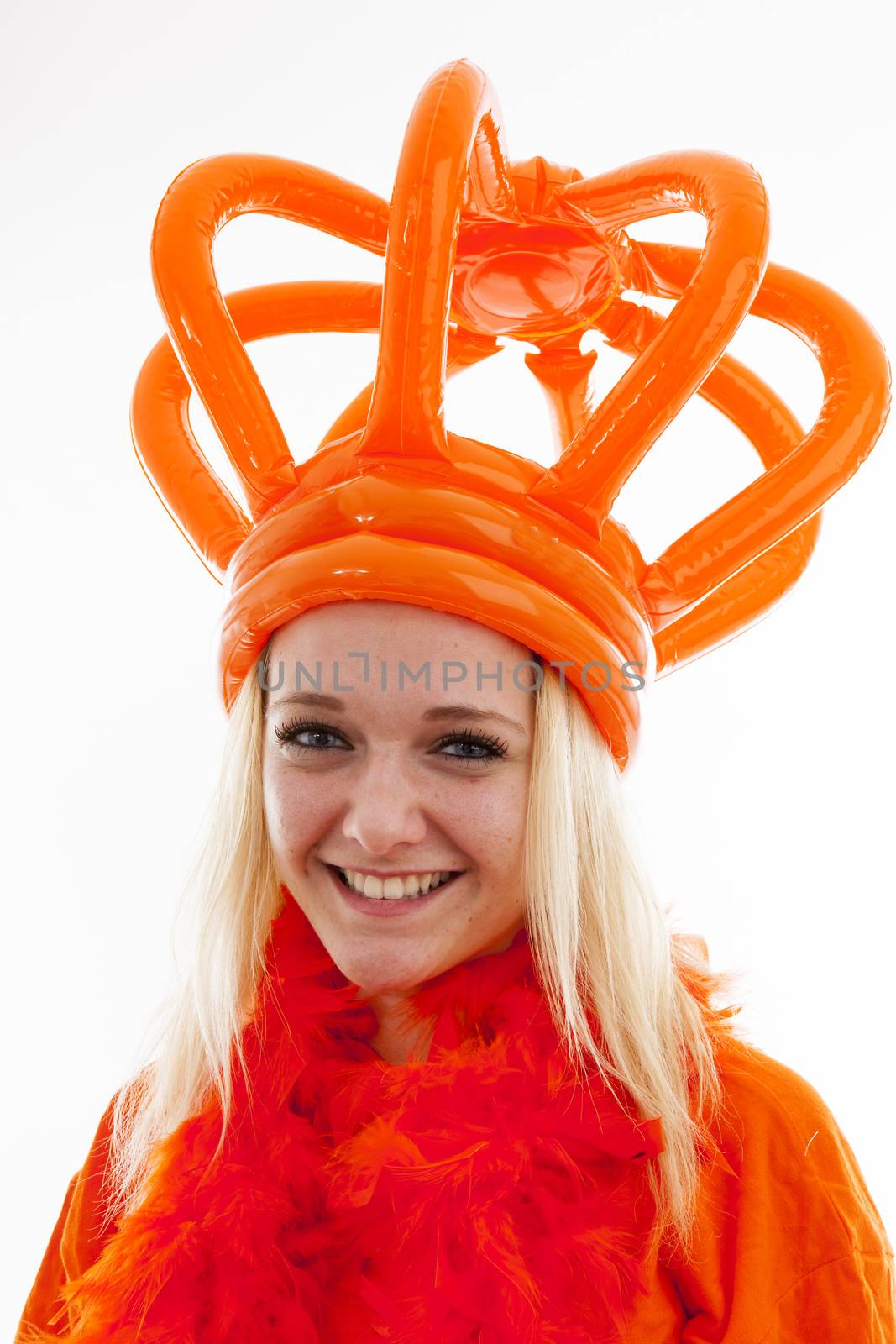 Young woman as Dutch orange supporter over white background