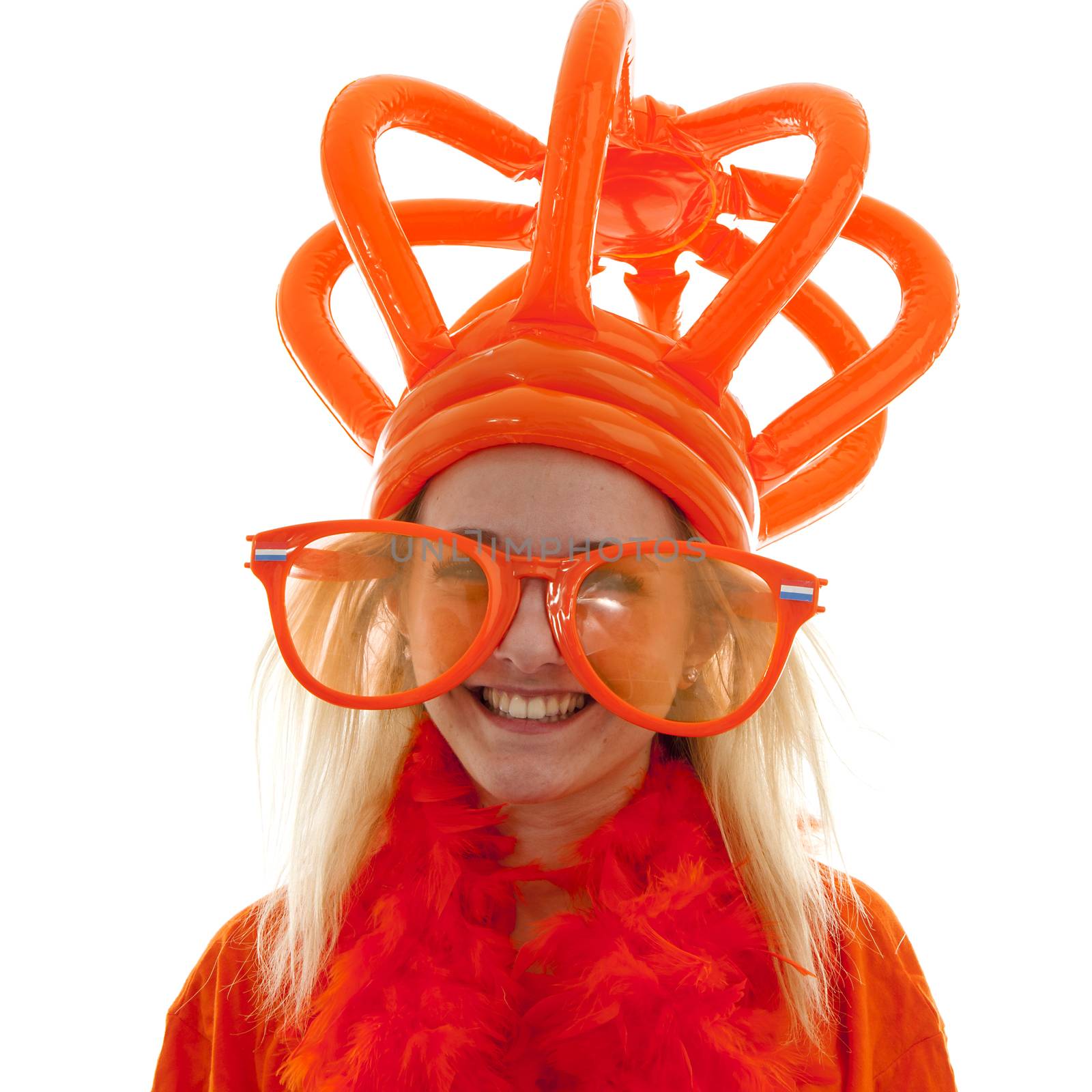 Young woman as Dutch orange supporter with crown over whiwte background