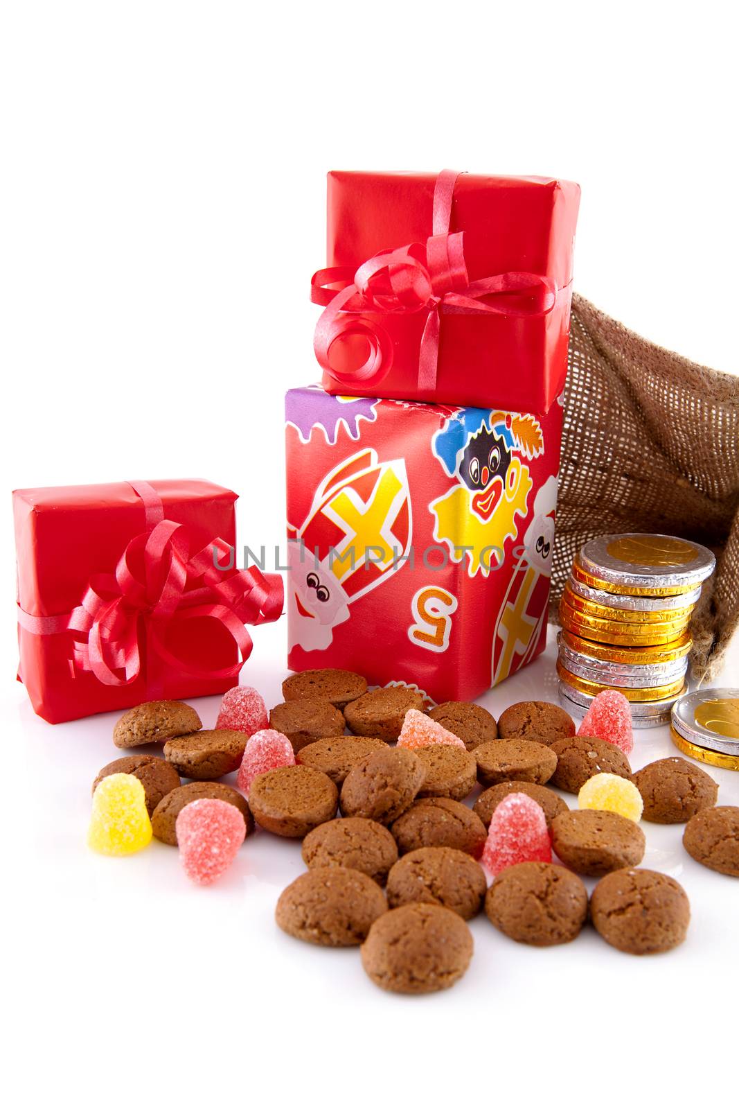 Typical Dutch celebration: Sinterklaas with surprises in bag and ginger nuts, ready for the kids in december. Isolated on white background