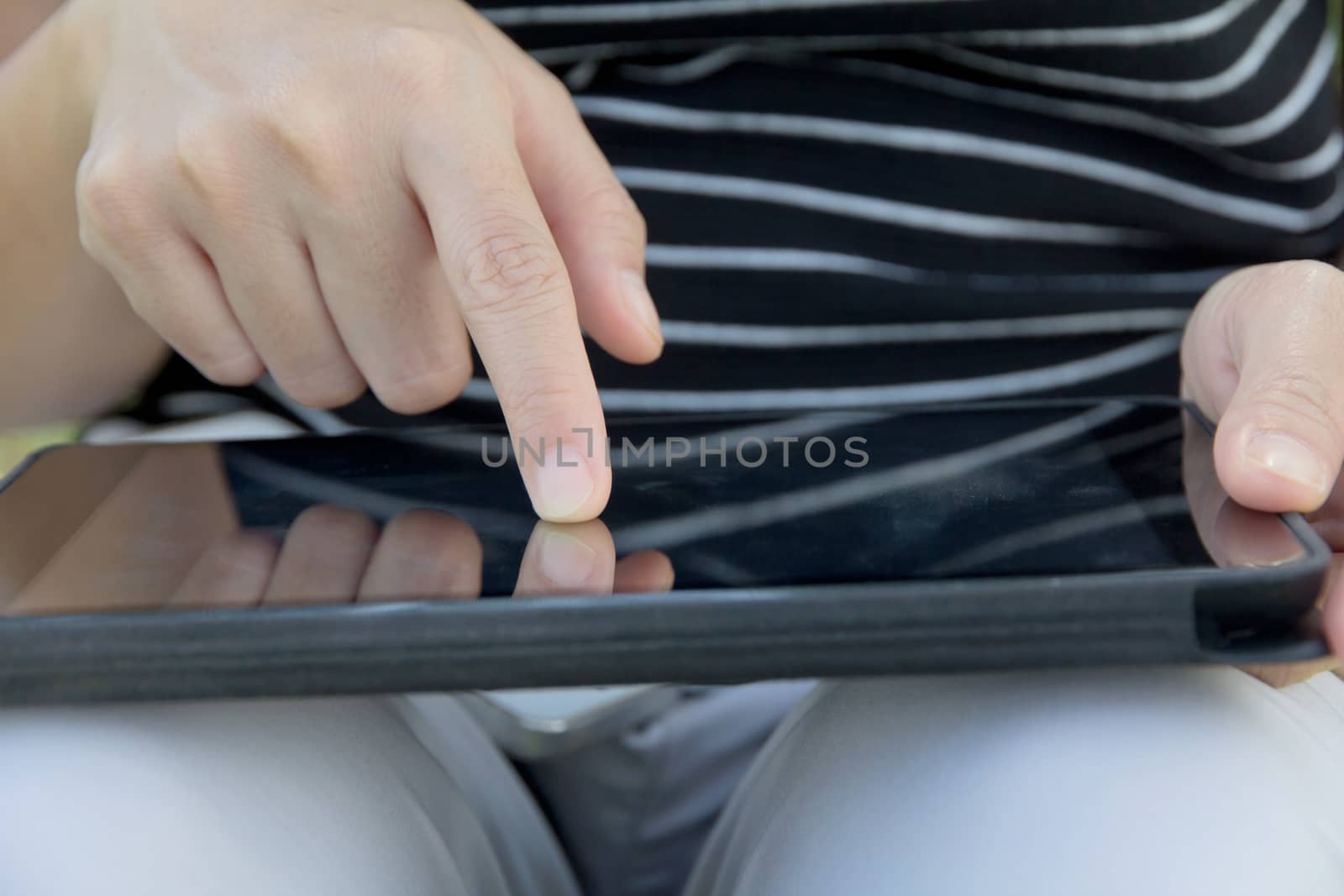 close up of people using digital tablet background