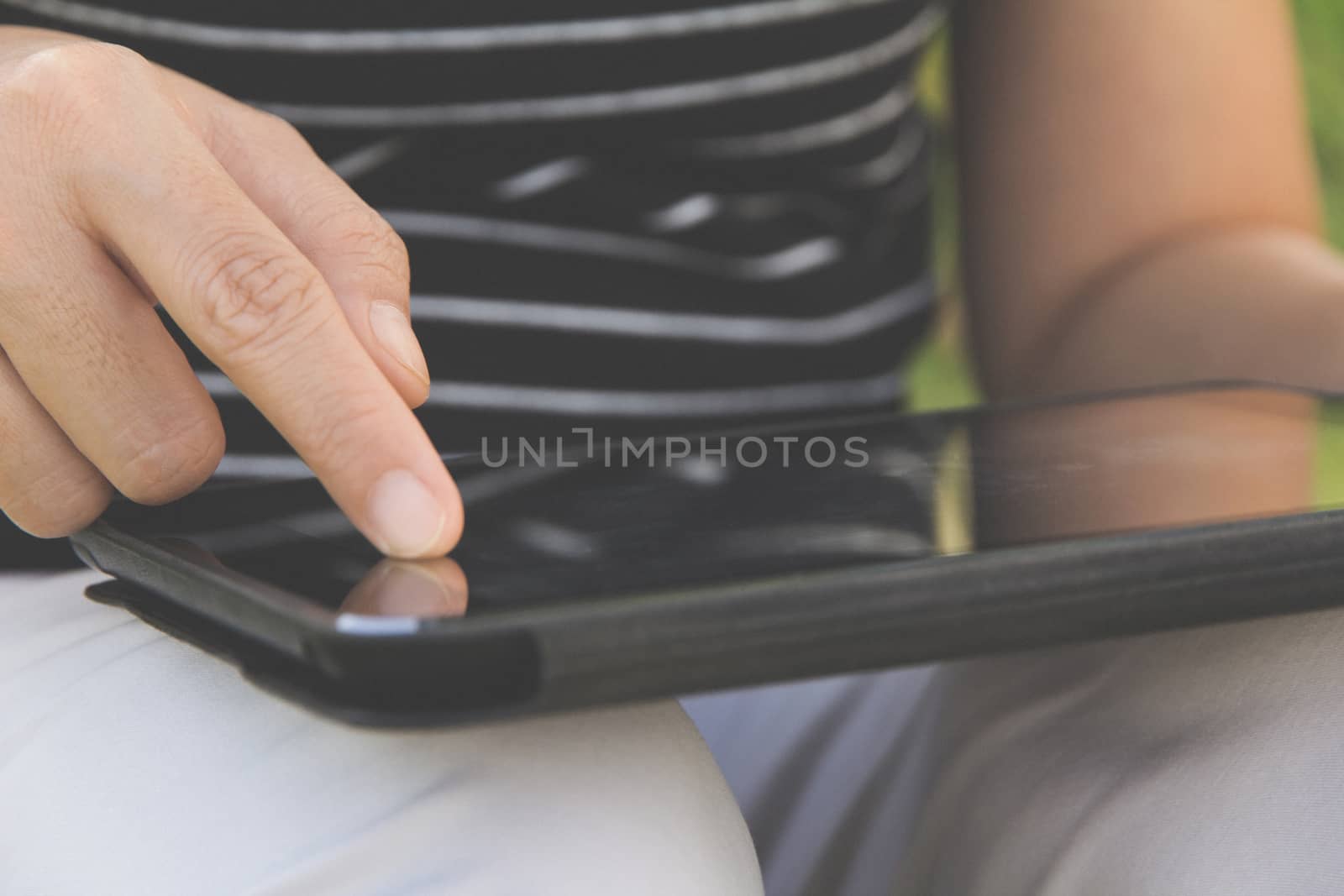close up of people using digital tablet background