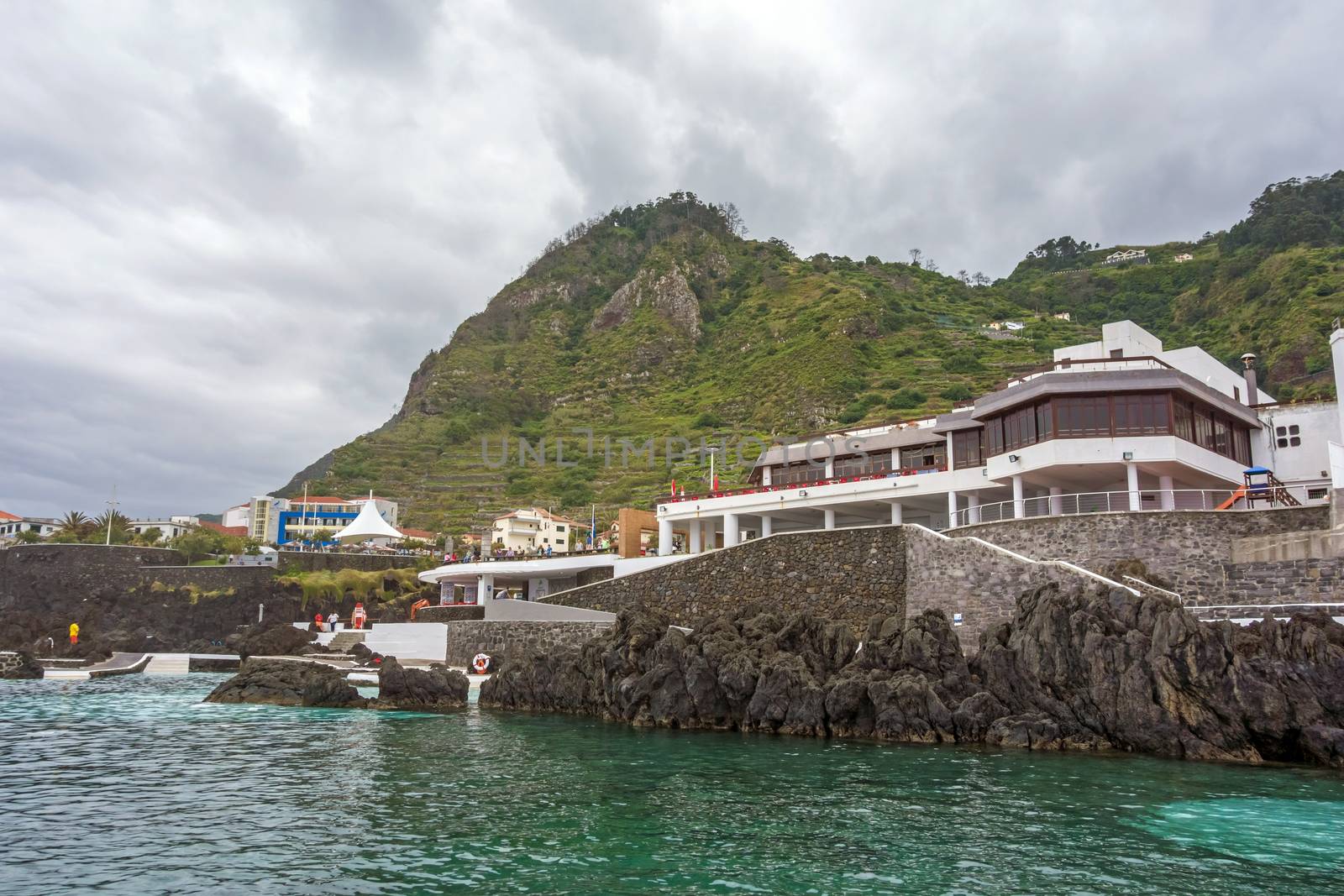 Porto Moniz, Portugal - June 2, 2013: Natural rock pool of Porto Moniz. It is a public bath with water from the Atlantic Ocean.