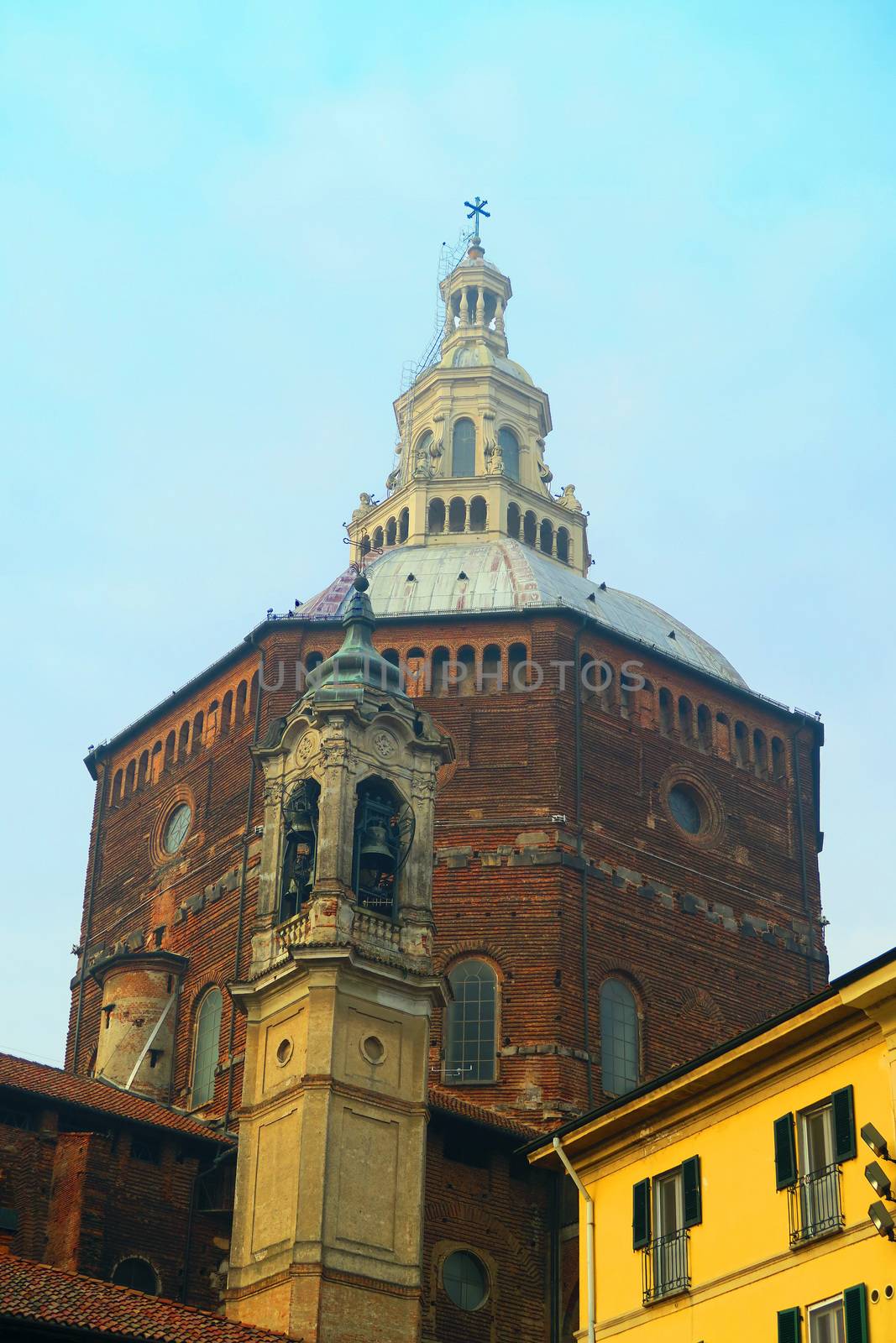 Pavia,Italy, 25 october 2015.Imposing dome of the cathedral of Pavia, Italy. It was built between 1882 and 1885 by Carlo Maciachini.The dome, with an octagonal plan, is 97 m tall, with a total weight of some 20,000 tons. It is the fourth in Italy in size, after St. Peter's Basilica, the Pantheon and the Cathedral of Florence.