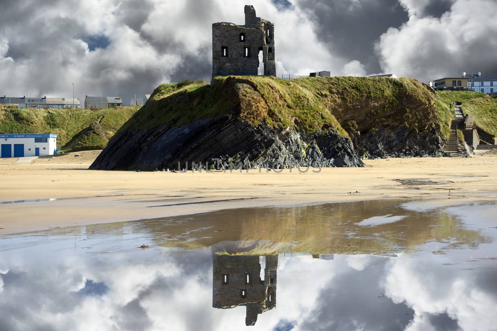 wild atlantic way castle ruins and beach by morrbyte