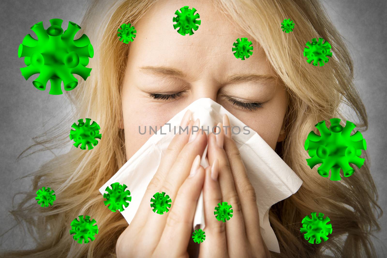 Portrait of a ill blond woman who is sneezing virus  in a tissue