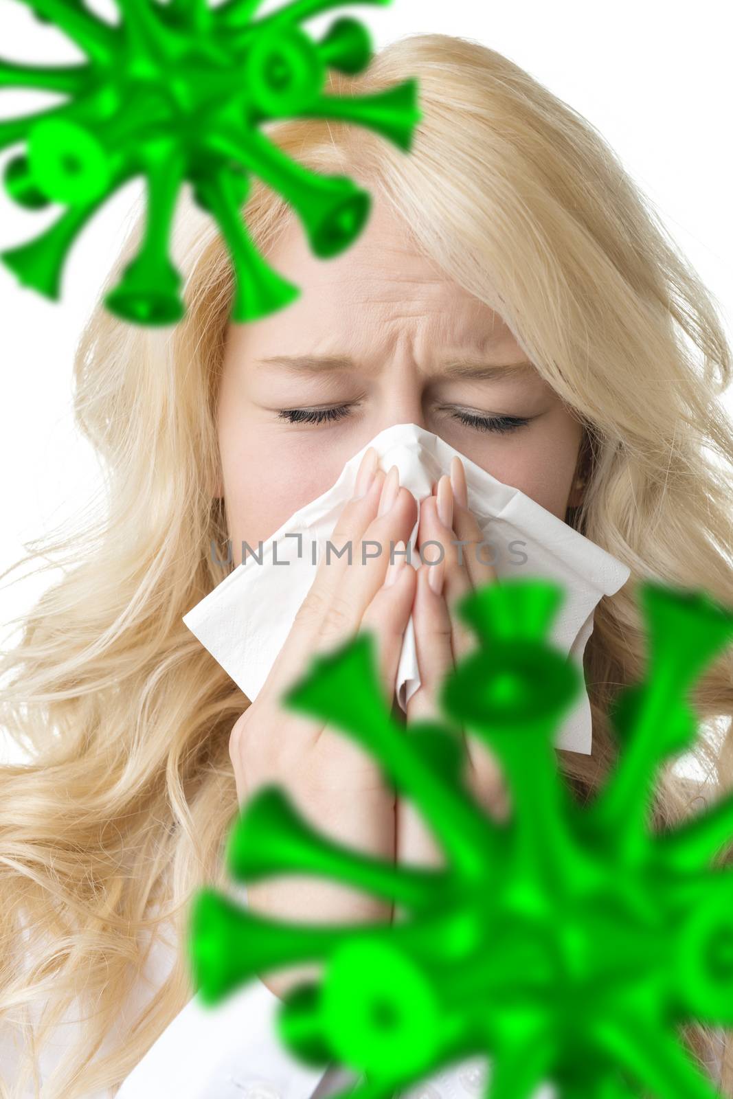 Portrait of a ill blond woman who is sneezing bacillus in a virus