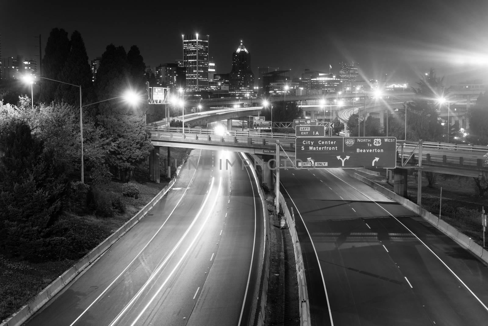 Cars create light trails in a long exposure over I-5 in Portland