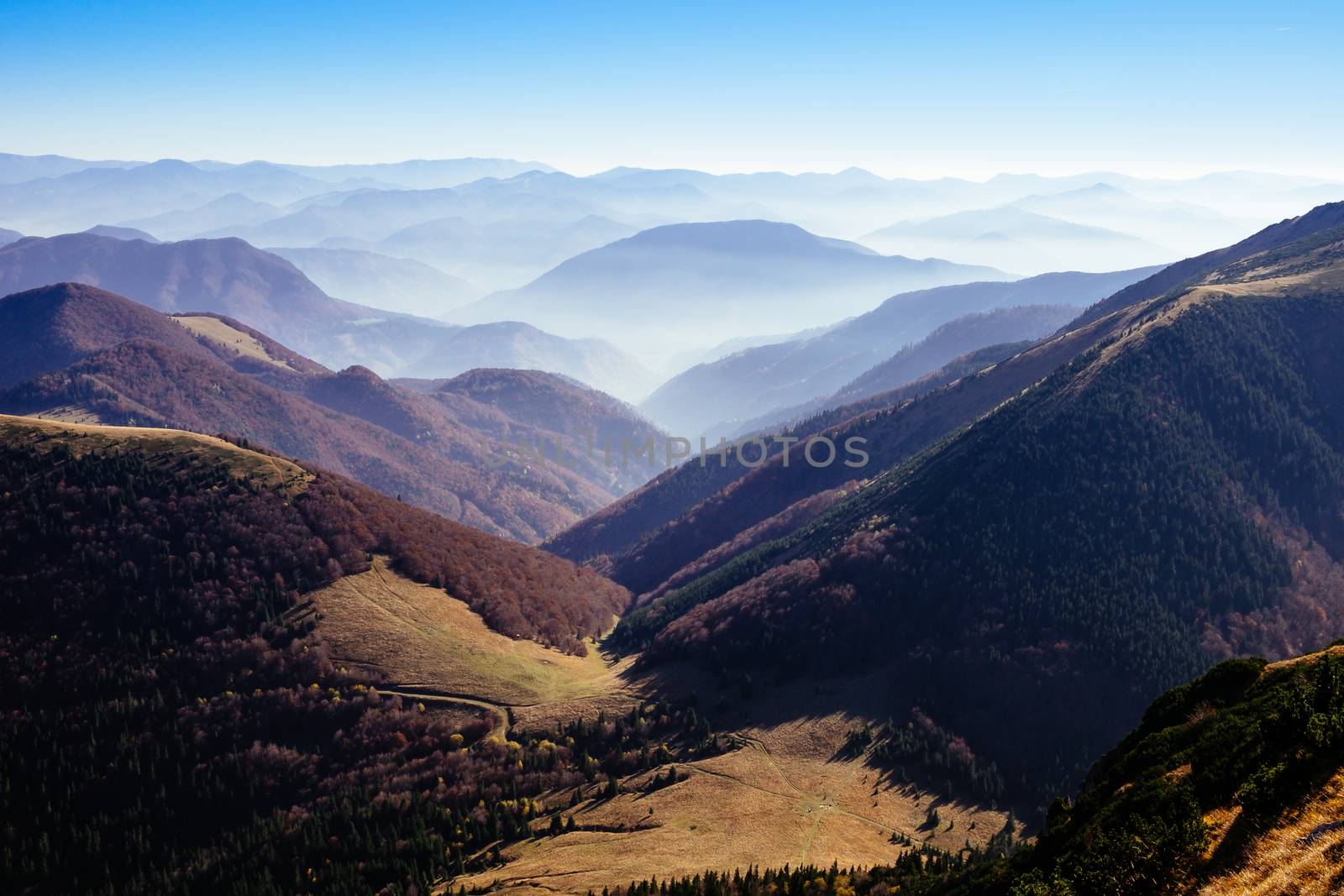 Scenic view of misty autumn hills and mountains, Slovakia by martinm303