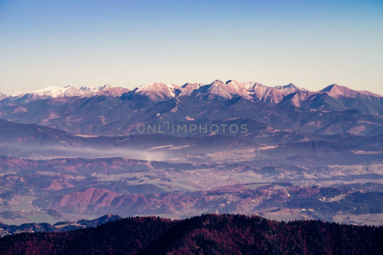 Scenic view of High Tatras mountain range in autumn, viewed from Mala Fatra mountains, Slovakia