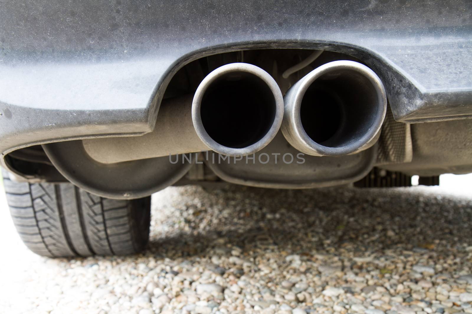 tailpipes of a car showing where the exhaust comes from