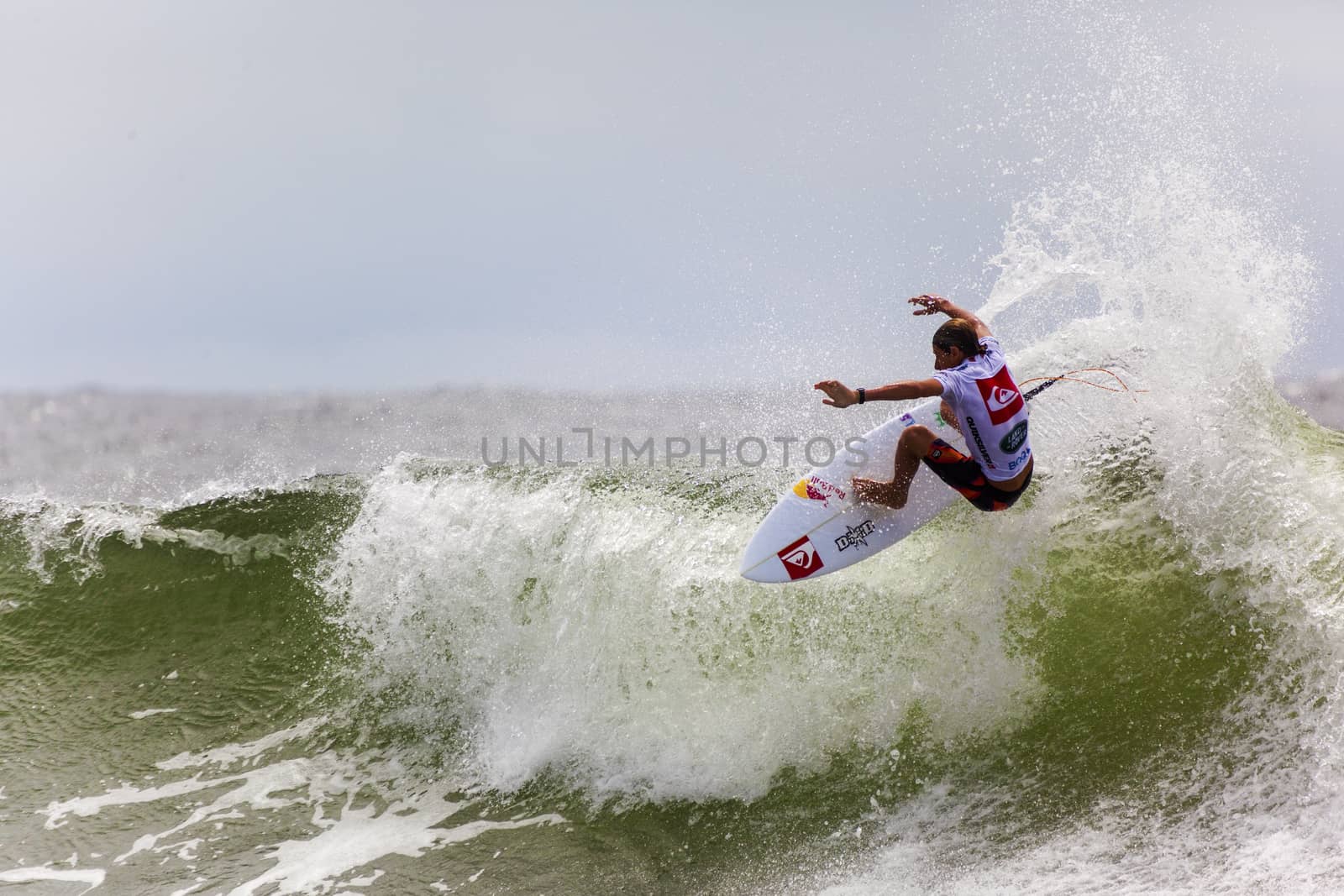 SNAPPER ROCKS, GOLD COAST, AUSTRALIA - 9 MARCH: Unidentified Surfer races the Quiksilver & Roxy Pro World Title Event. 9 March 2013, Snapper Rocks, Gold Coast, Australia