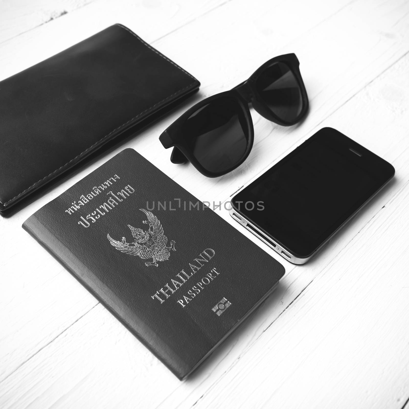 travel gadget over white table black and white color