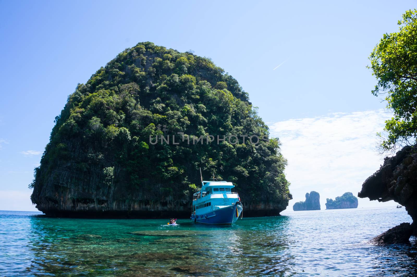 Phi Phi Island was very famous island in Phuket, Thailand. Tourist come from everyway to visit here, the was crystal clear, can see the base ocean by nake eye. The natural mountain was amazing. This is take it at small Phi Phi island, Maya bay.
Phi Phi Island was the most famous Island in the Phuket, over 10 million tourist visit here every year. It have big and small Phi Phi Island, and the most beautiful beach was locate in small Phi Phi Island, Maya bay, this photo was show environment of Maya bay. Surrounding with mountain, crystal clear sea water, pure white sand shoeless beach. Movie "The Beach" act by Leonardo Di Caprio was filmed here on year 2000.