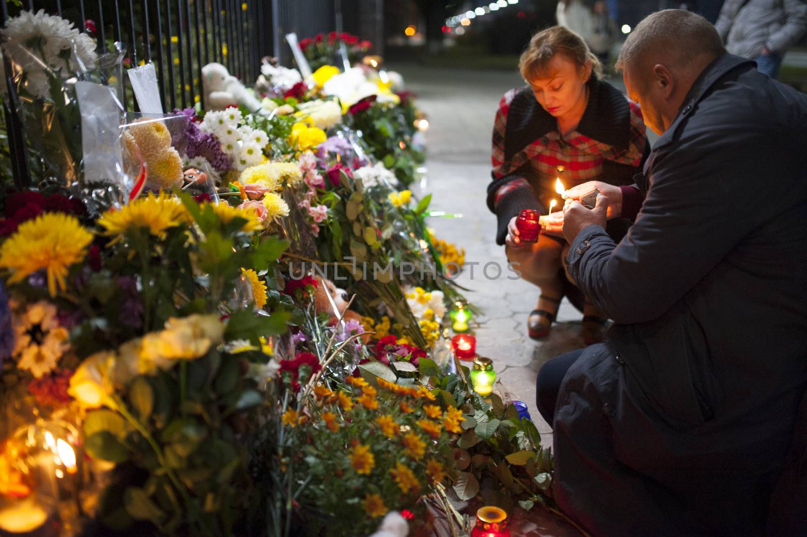 UKRAINE, Kiev: People light candles outside the Russian embassy in Kiev, Ukraine, to pay tribute to the victims of crashed Russian Metrojet plane in Egypt, on November 1, 2015. The Airbus, with 224 people on board, crashed in a mountainous part of Egypt's Sinai Peninsula on October 31, 2015