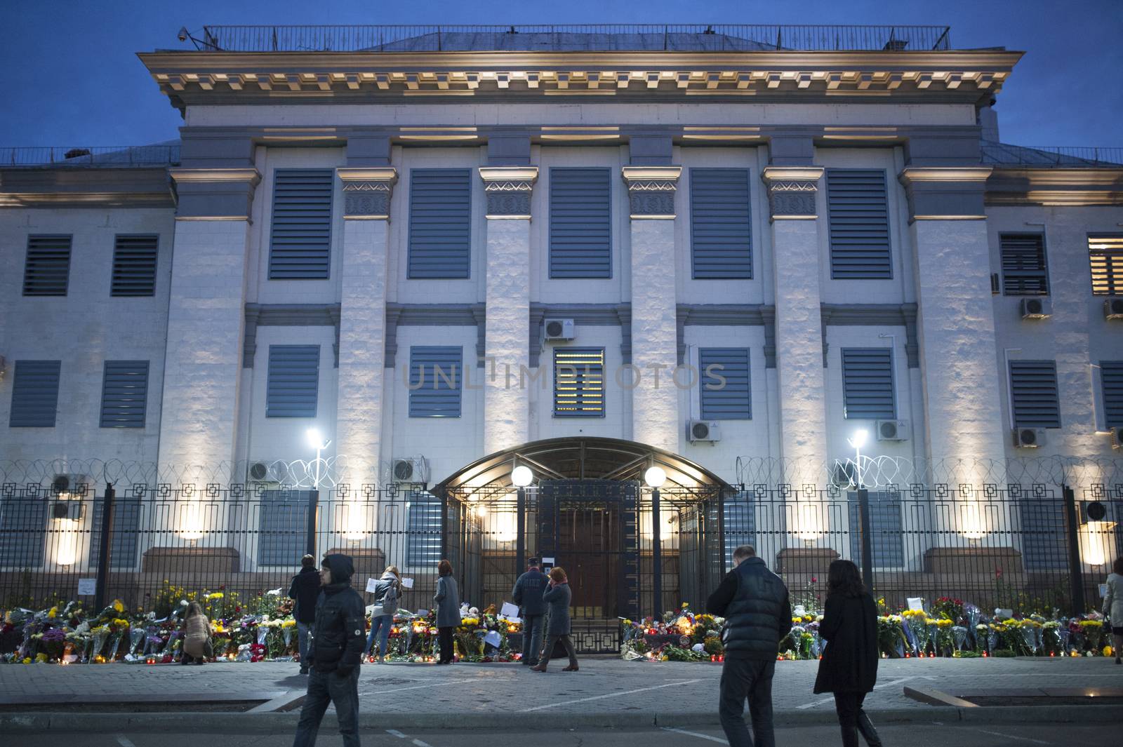 UKRAINE, Kiev: People lay flowers and put candles outside the Russian embassy in Kiev, Ukraine, to pay tribute to the victims of crashed Russian Metrojet plane in Egypt, on November 1, 2015. The Airbus, with 224 people on board, crashed in a mountainous part of Egypt's Sinai Peninsula on October 31, 2015