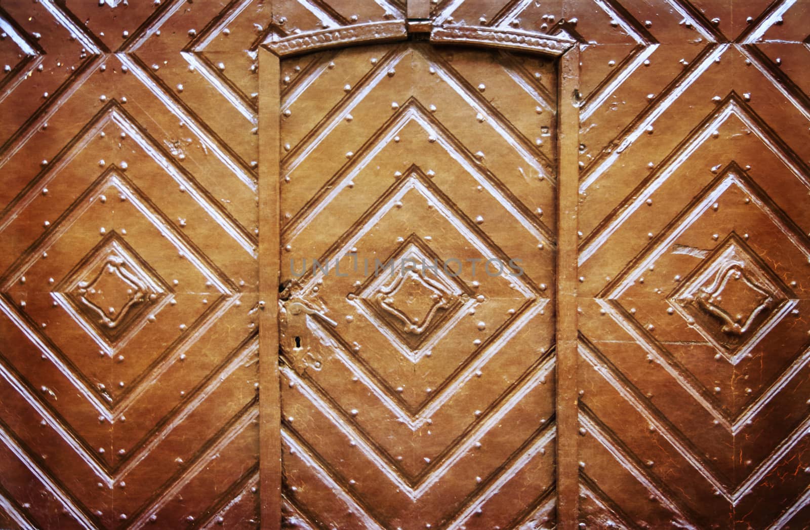 Retro filtered picture of old wooden gate. Photo in old color image style.