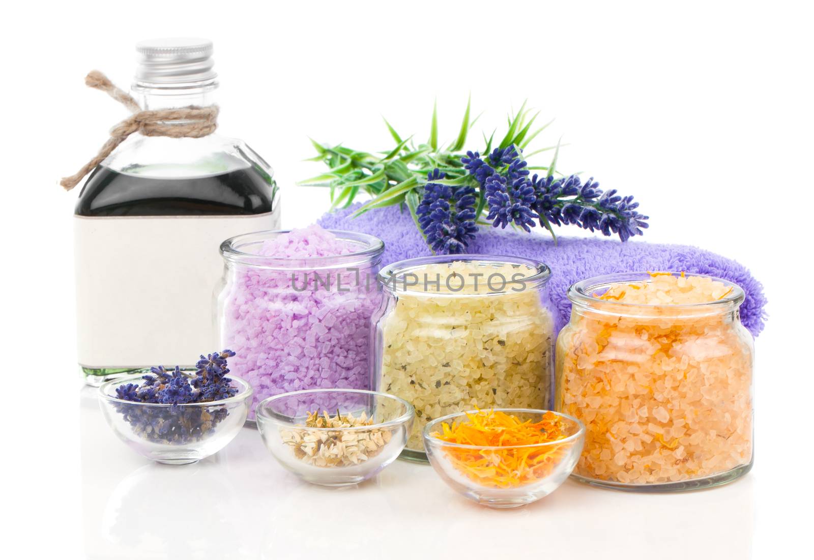 various kinds of bath salt with flowers, isolated on white backg by motorolka
