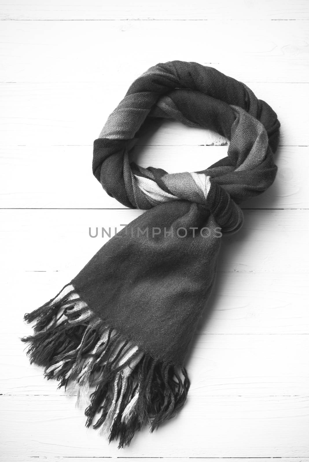 blue scarf over white wood table background black and white color