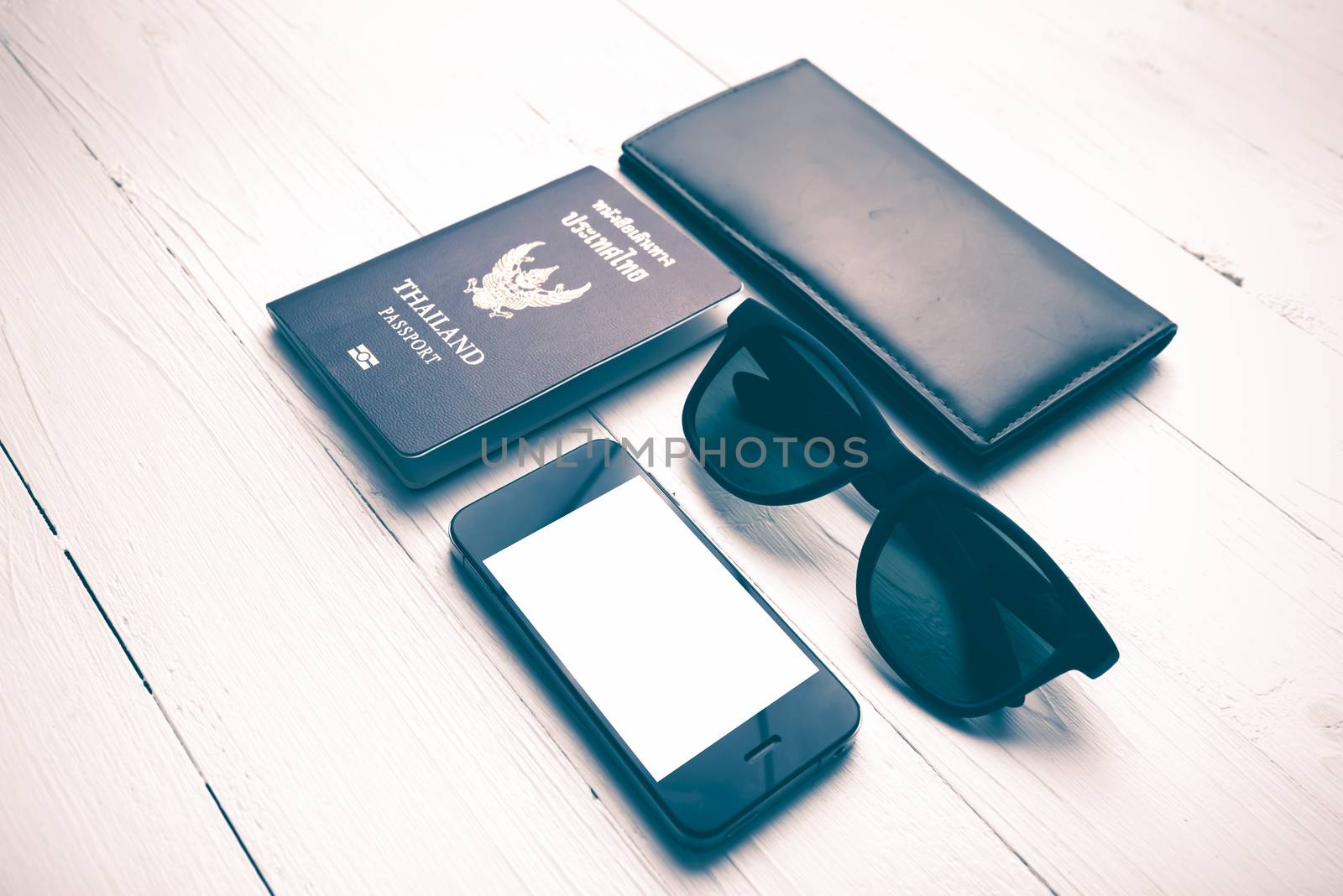 travel gadget over white table vintage style