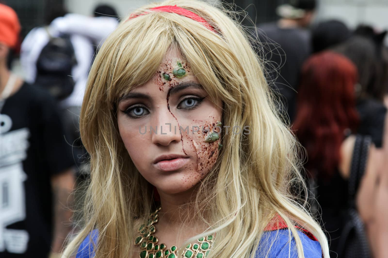Sao Paulo, Brazil November 11 2015: An unidentified girl in Super Woman costumes in the annual event Zombie Walk in Sao Paulo Brazil.