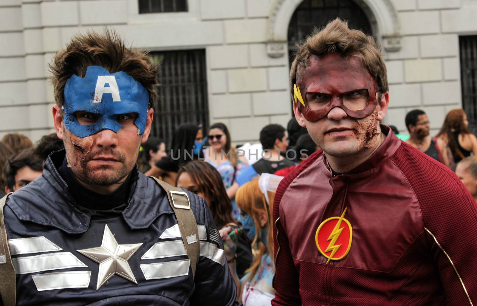 Sao Paulo, Brazil November 11 2015: Two unidentified men in super heroes costumes in the annual event Zombie Walk in Sao Paulo Brazil.