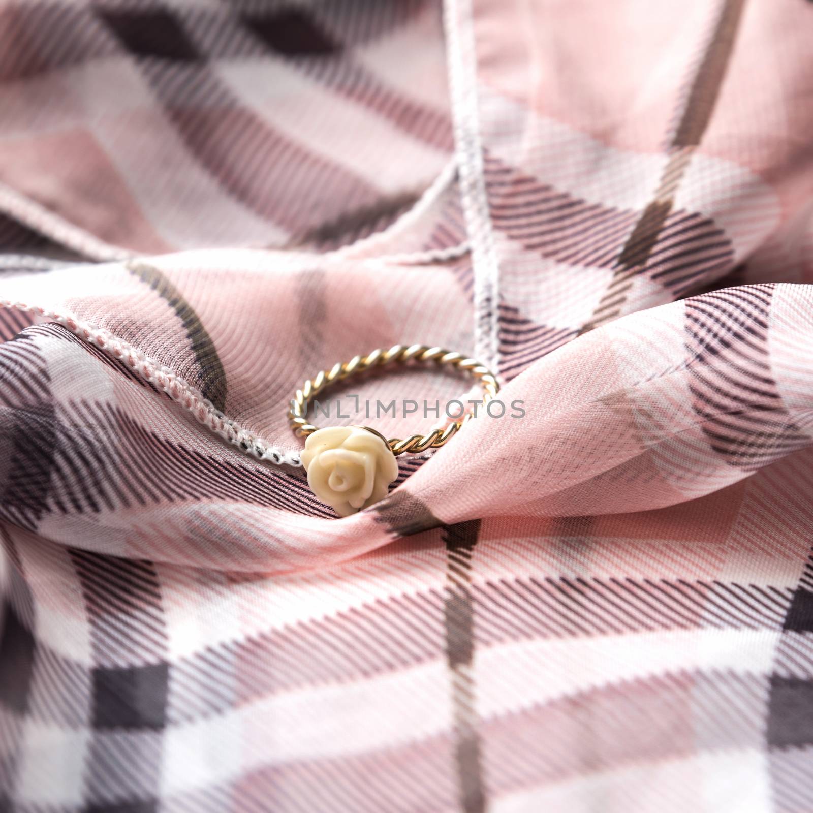 ring on scarf background
