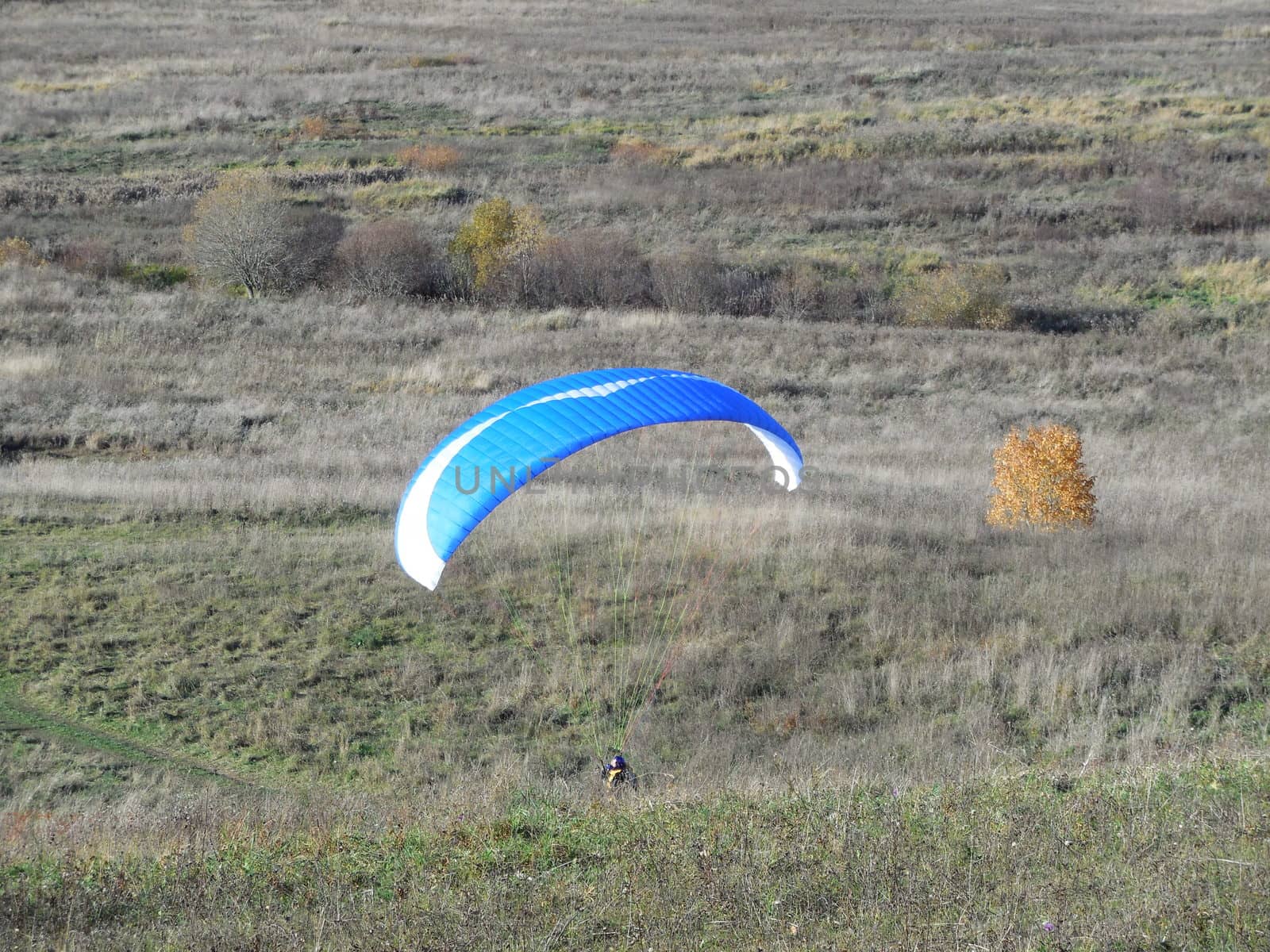 land occupations paraglider pilot, raising paraglider