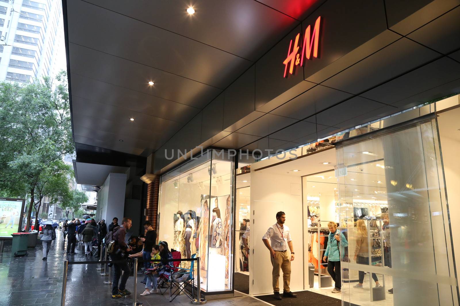 AUSTRALIA, Sydney: A queue forms outside the H&M store in Pitt Street Mall, Sydney on November 4, 2015 ahead of the official launch of the Balmain X H&M fashion range on November 5, 2015.
