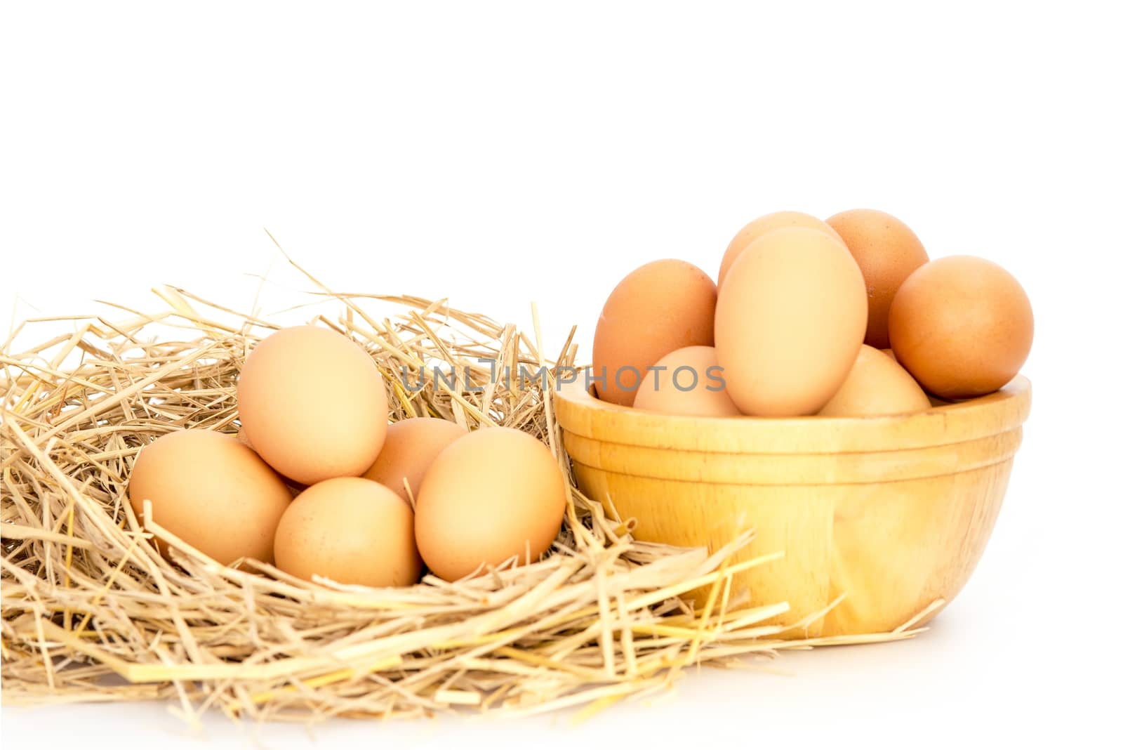 Egg, Chicken Eggs in a basket and a bowl isolate on white