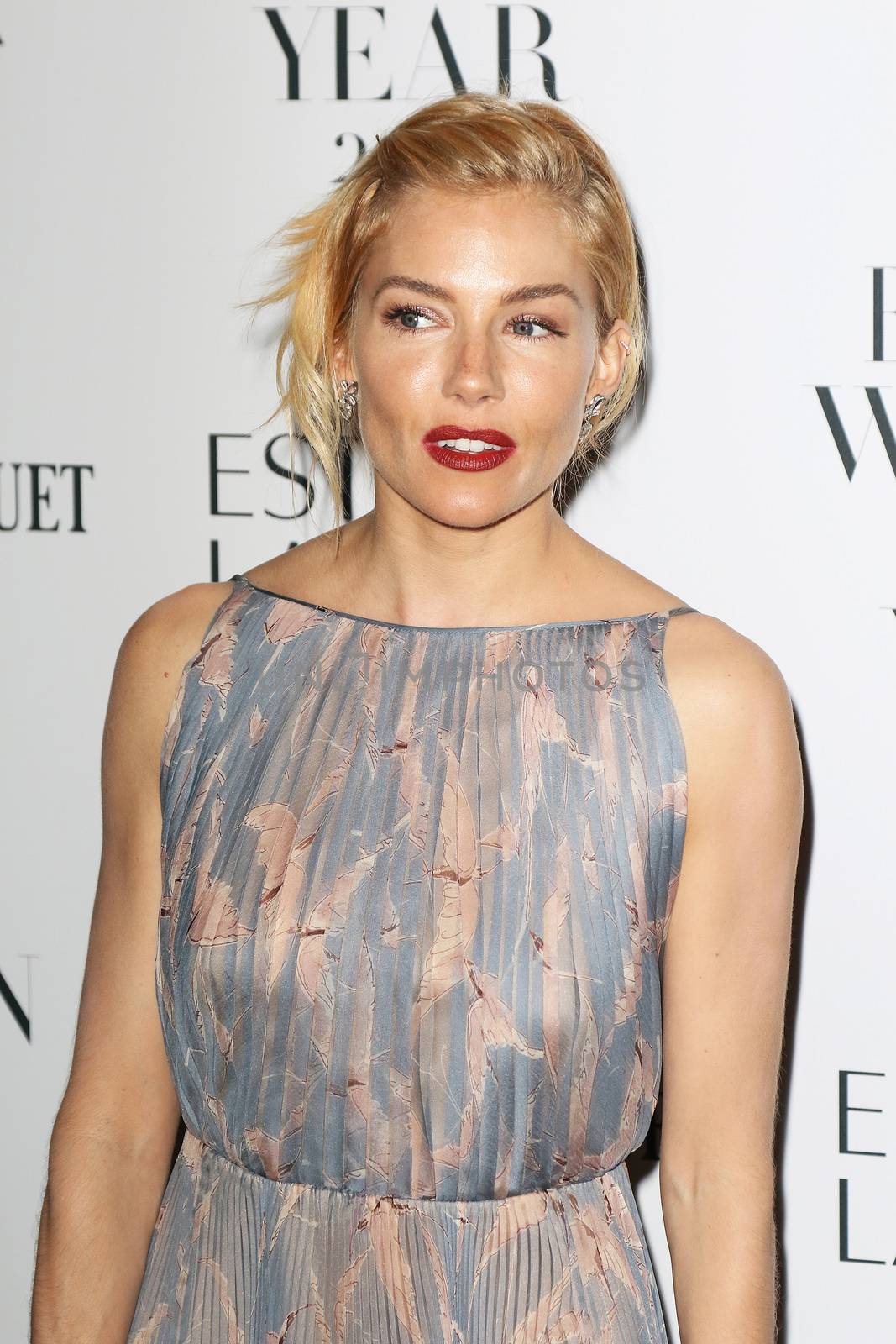 UNITED KINGDOM, London: Sienna Miller poses during the Harper's Bazaar Women of the Year Awards at Claridge's, in London, on November 3, 2015.