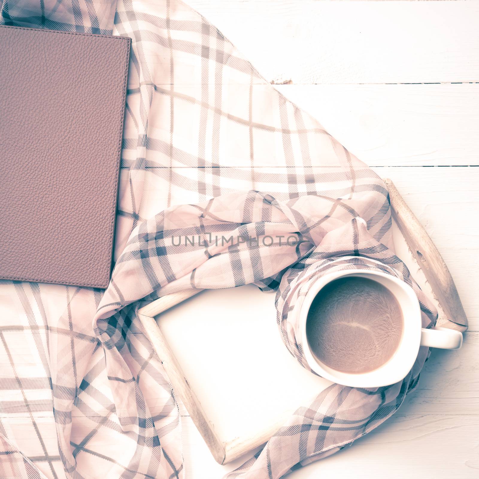 coffee and scarf background on white table vintage style