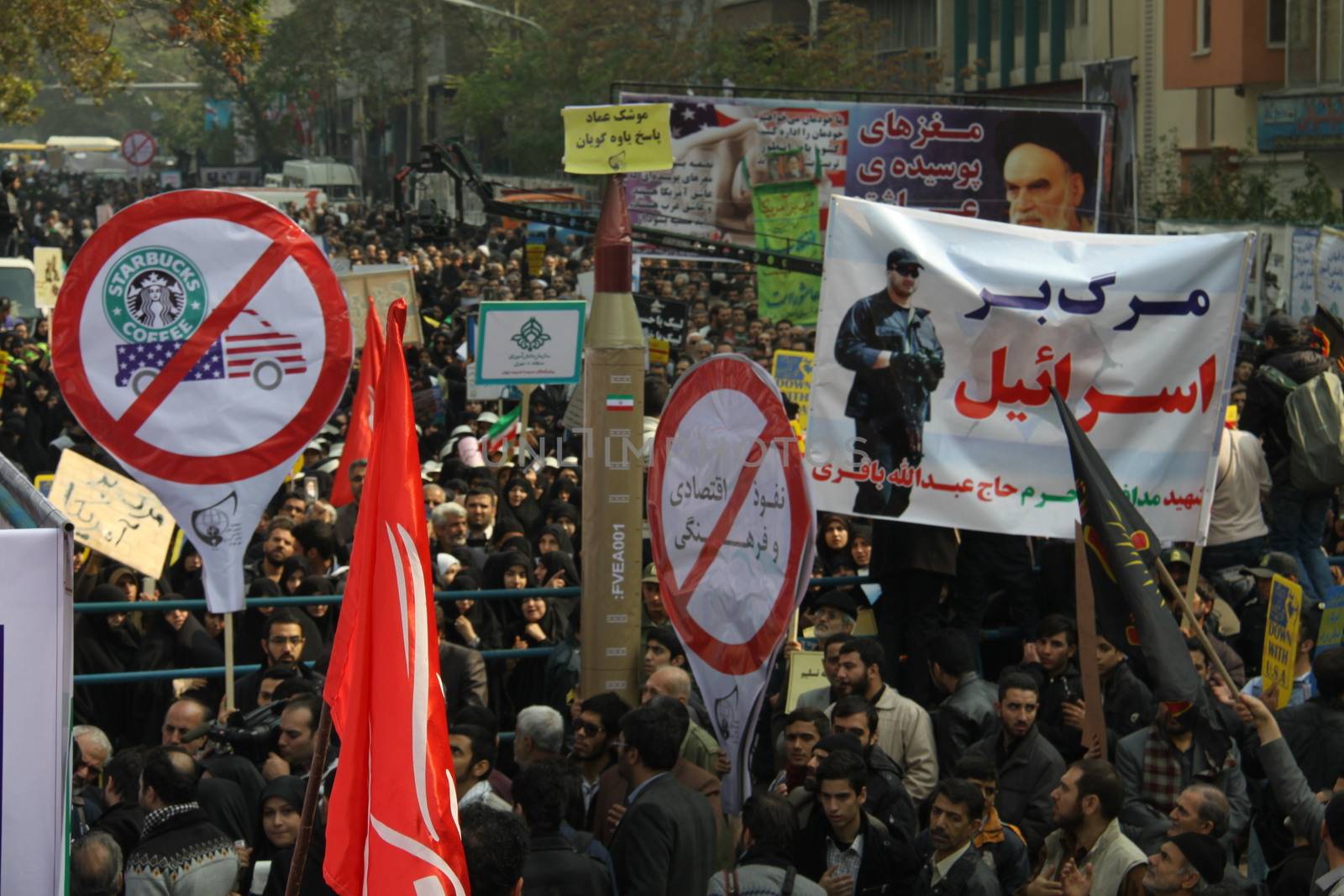 IRAN, Tehran: Hundreds of people march in front of the former US embassy in Tehran, during the '13 Aban' (4th of November in english), on November 4, 2015, to commemorate the anniversary of the 1979 US embassy taking and protest against the United States of America.