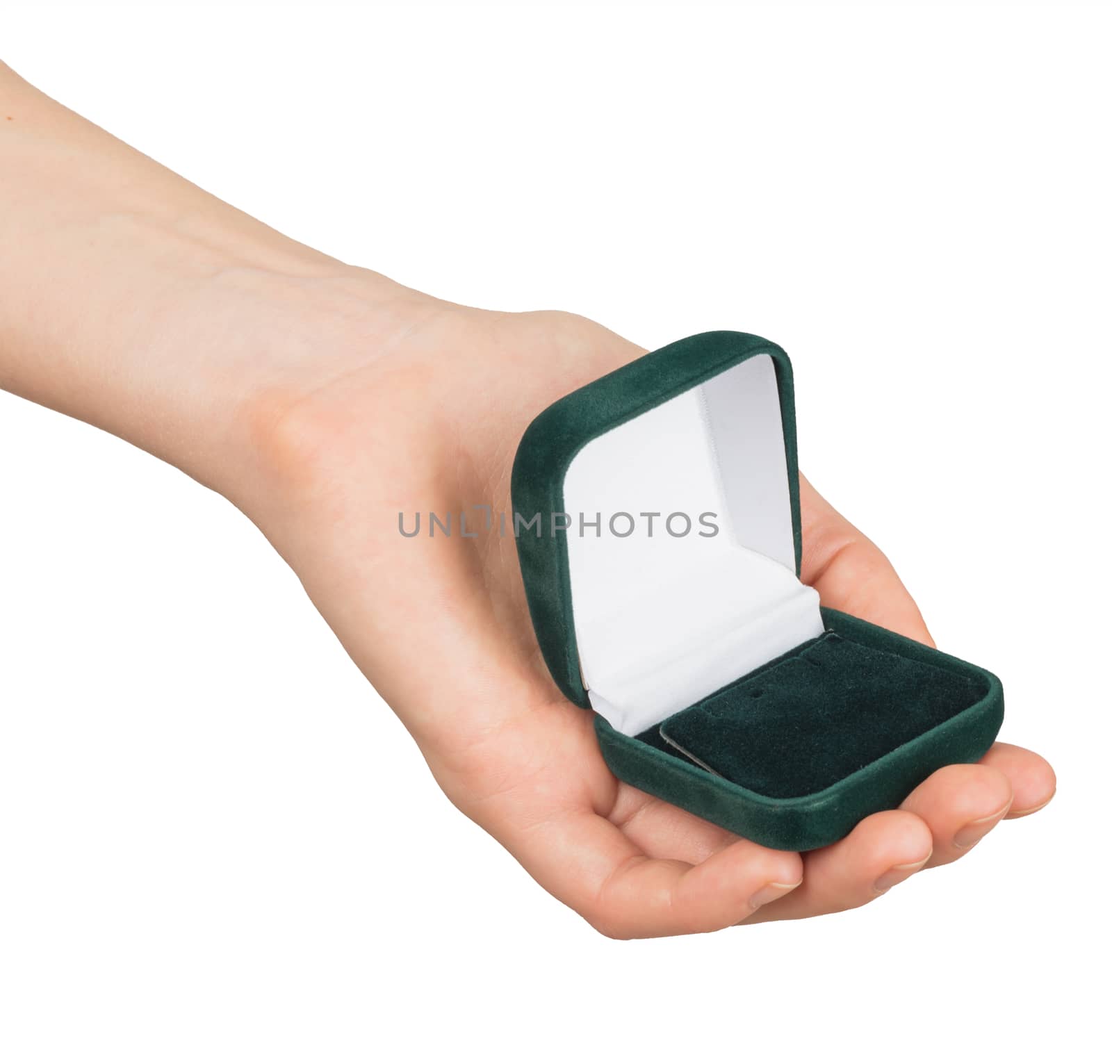 Empty ring box in humans hand on isolated white background