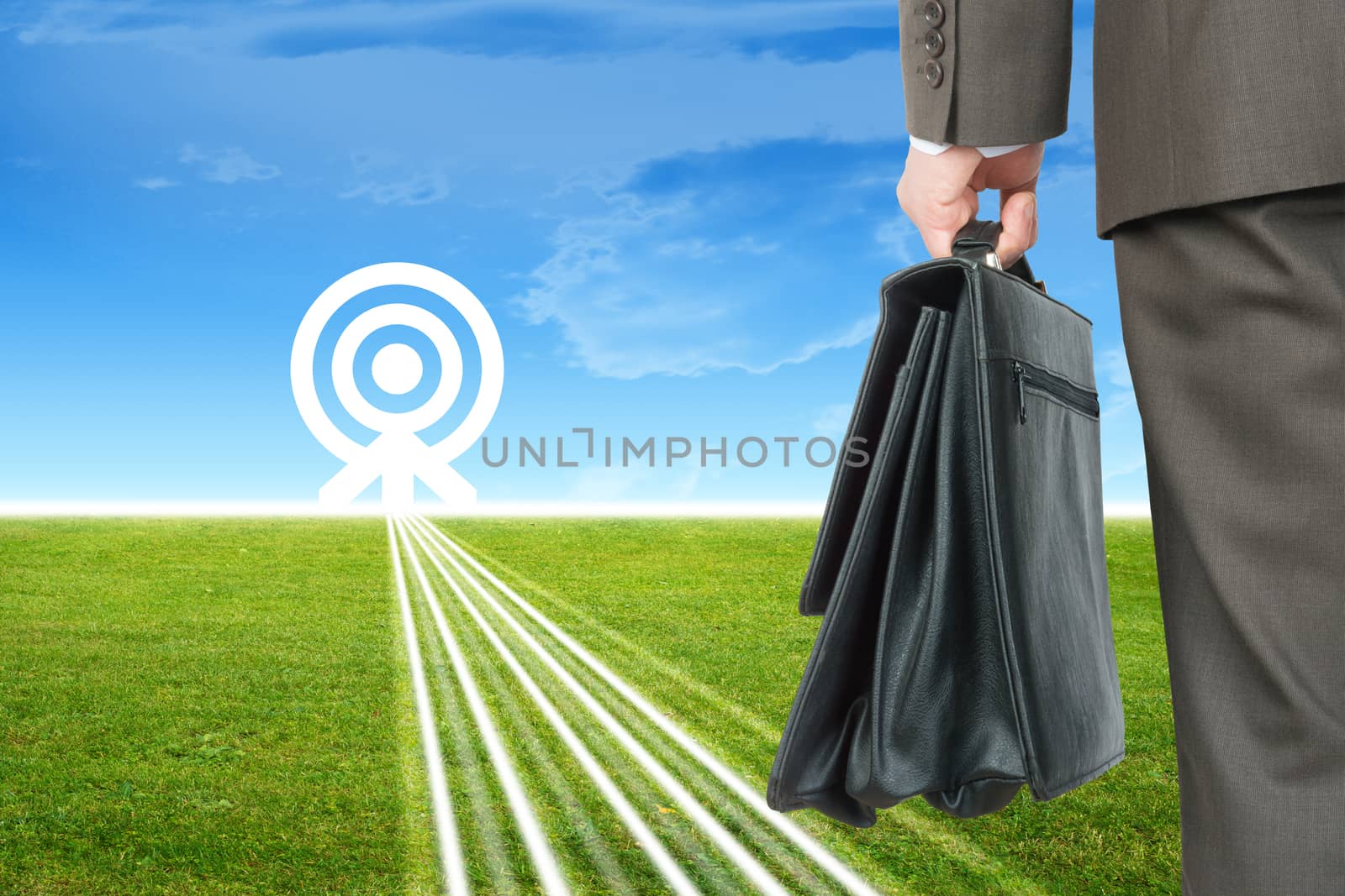 Businessman with case on abstract background, rear view