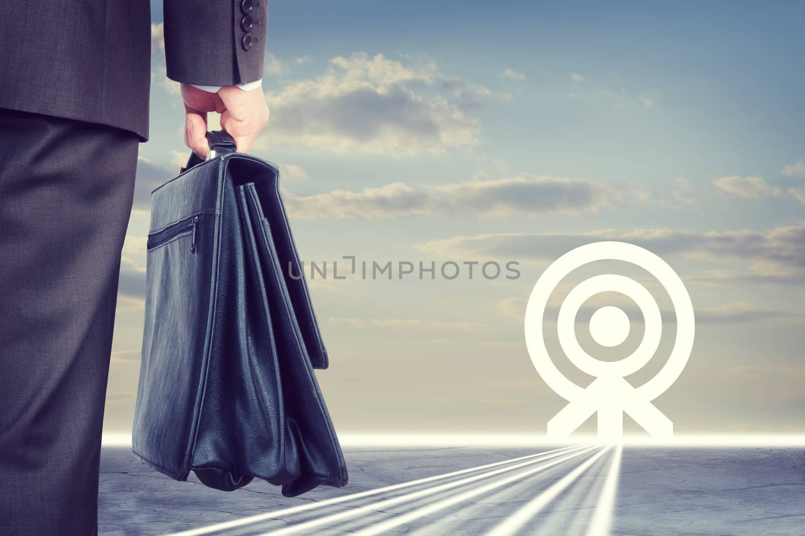 Businessman with suitcase and goal symbol by cherezoff