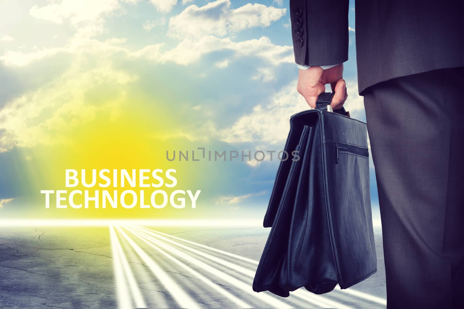Man with suitcase and words business technology by cherezoff