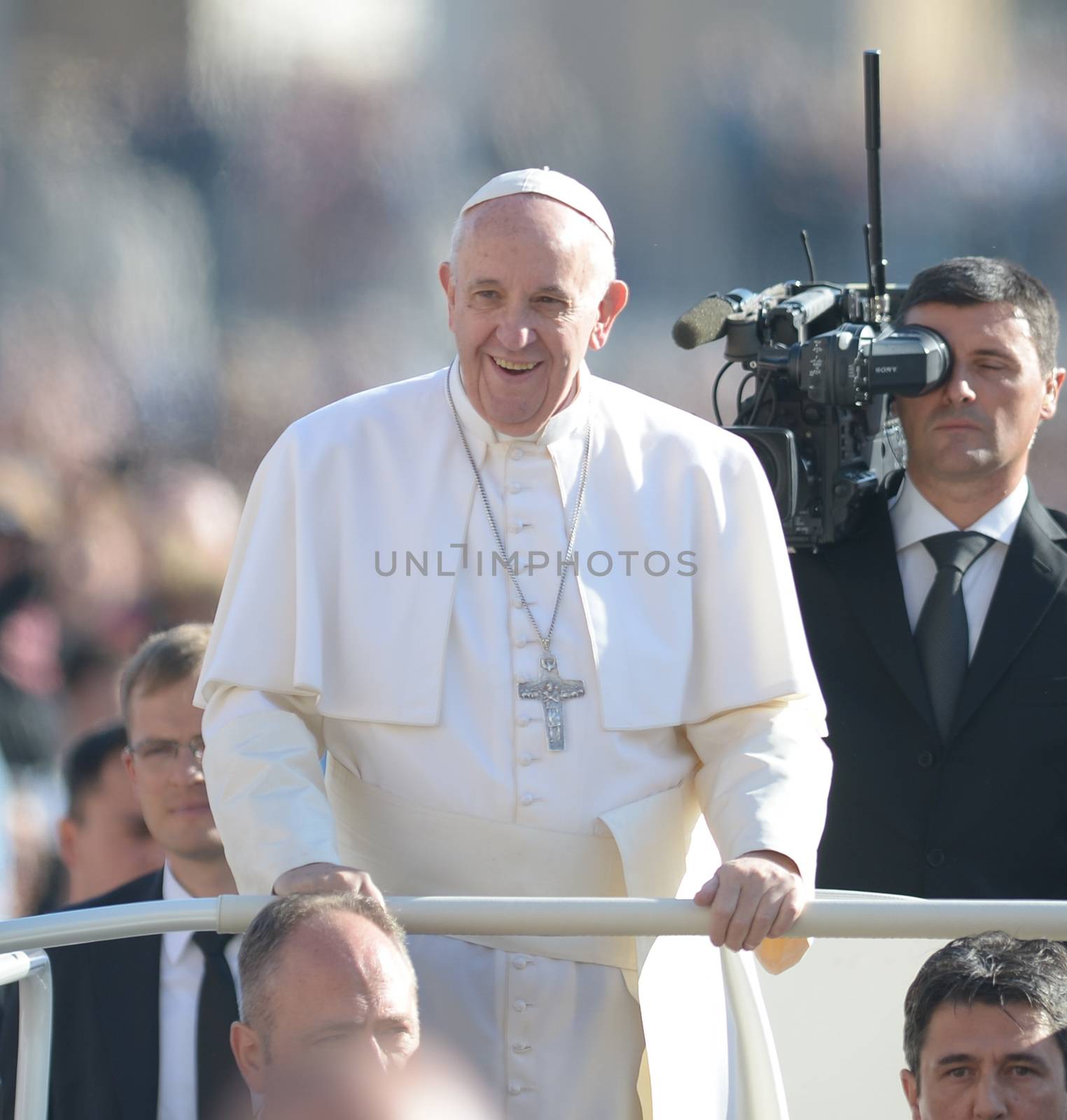 VATICAN: Pope Francis stands among the crowd after his weekly audience in St. Peter's Square at The Vatican on November 4, 2015 in Vatican City, Vatican.