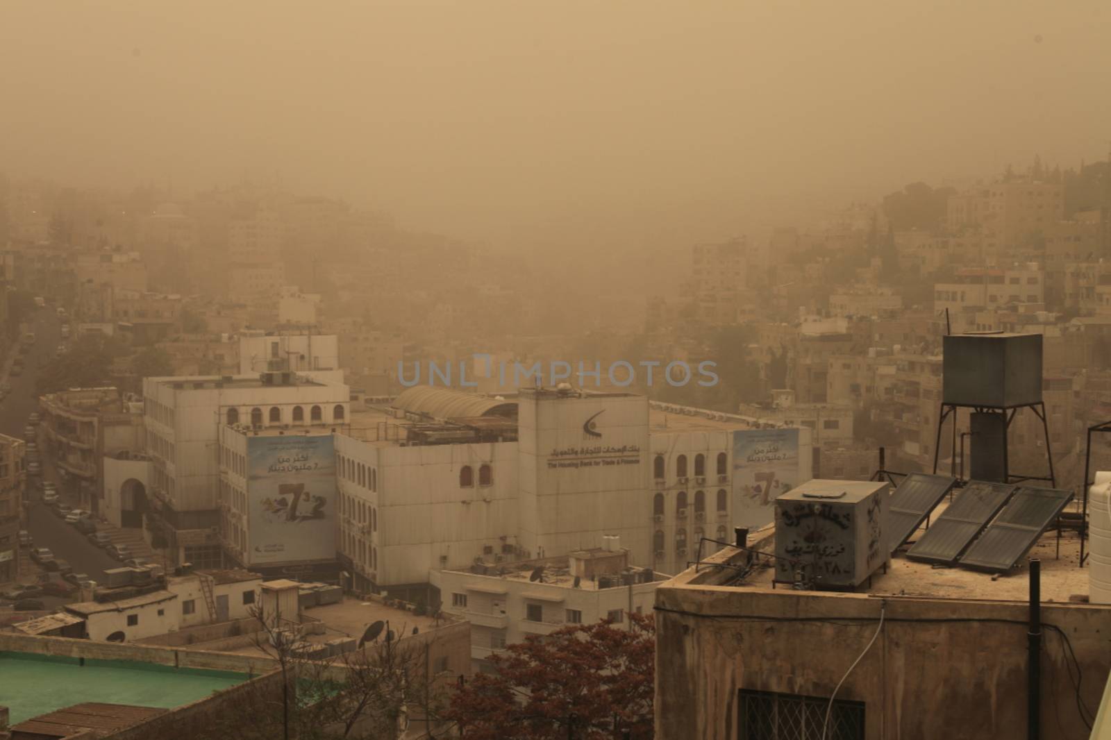 JORDAN, Amman : A thick sandstorm cloak the Jordan capital city Amman in Othman Bin Affan street and other regions in the Middle East on November 4, 2015, disrupting travel for the US first lady. 