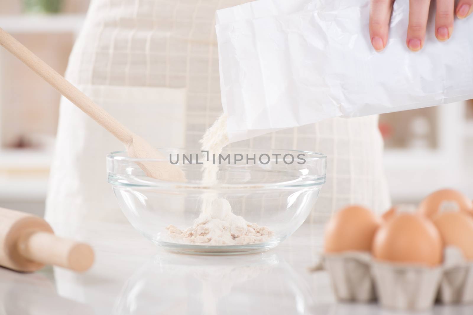 Close up of pour flour for making dough.