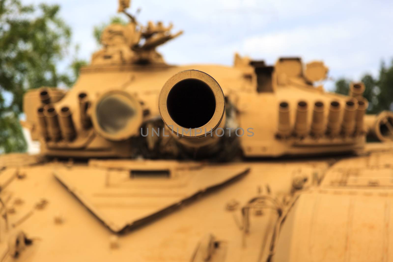 CALGARY CANADA JUN 13 2015:  The Military Museum organized "Summer Skirmish" event where an unidentified soldier is seen  in a historical Reenactment Battle. T-72 main battle tank on display.