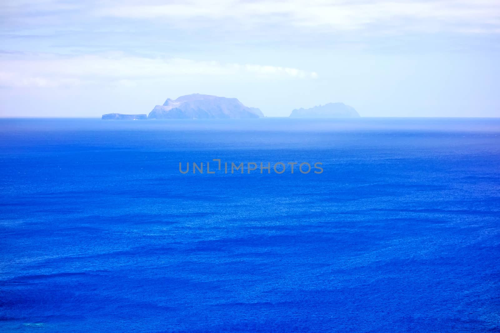 Islands (Ilhas Desertas) in the east of Madeira, from left to right named Chao, Deserta Grande, and Bugio - view from town Canical