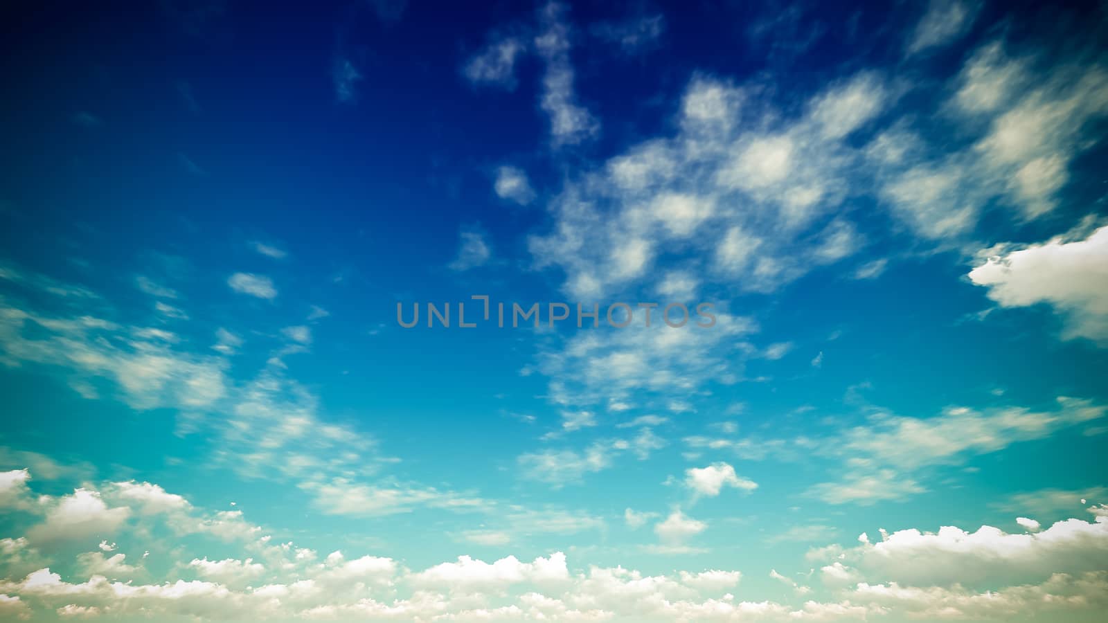 Cloudy blue sky abstract background by teerawit