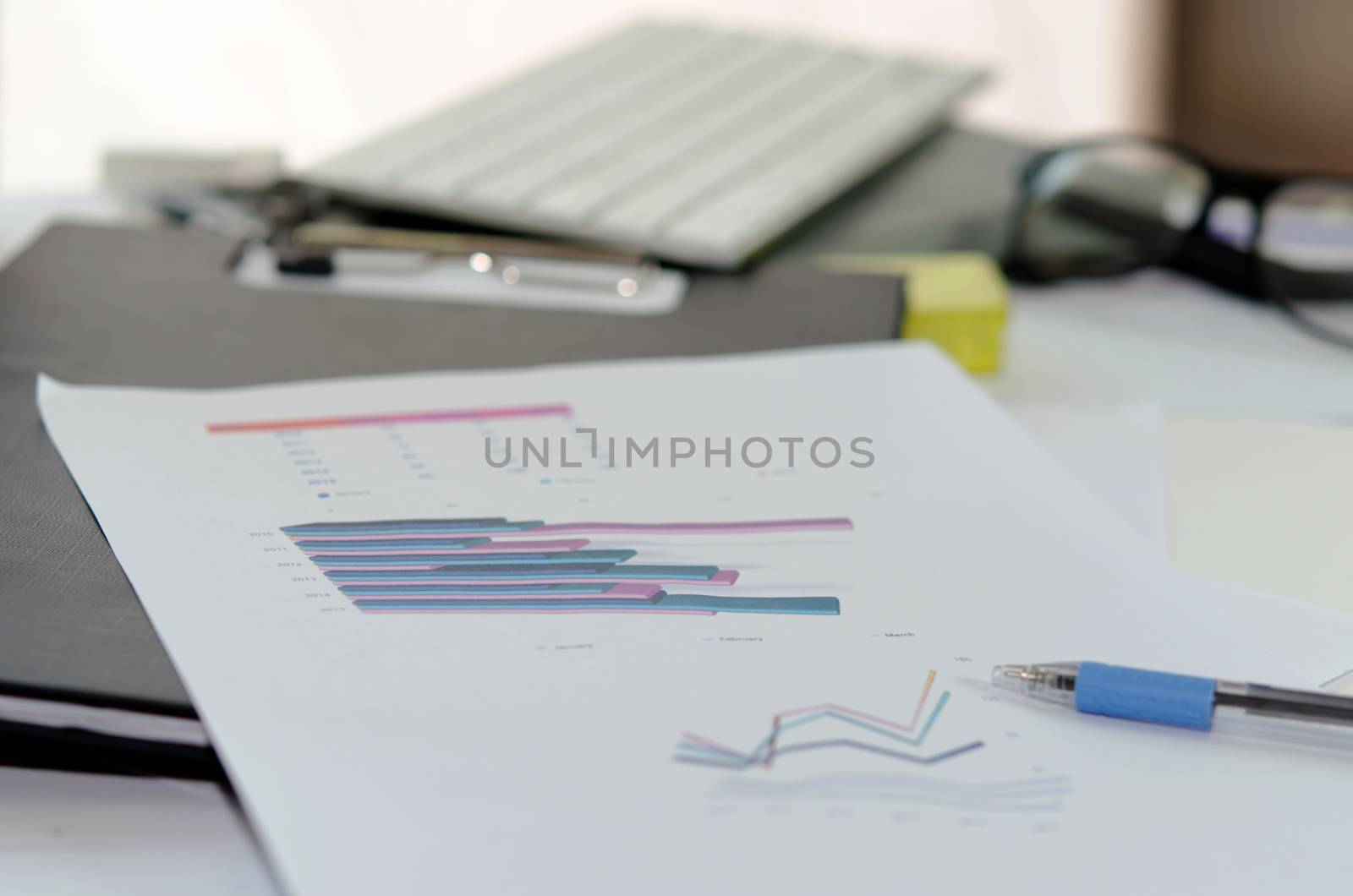 Business of financial analytics desktop with accounting charts and diagrams