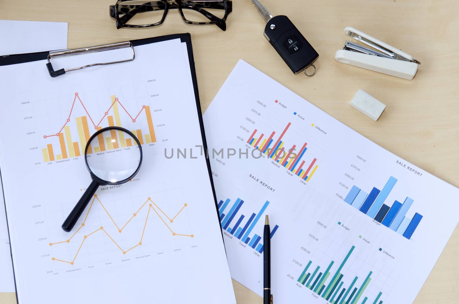 Business of financial analytics desktop with accounting charts and diagrams