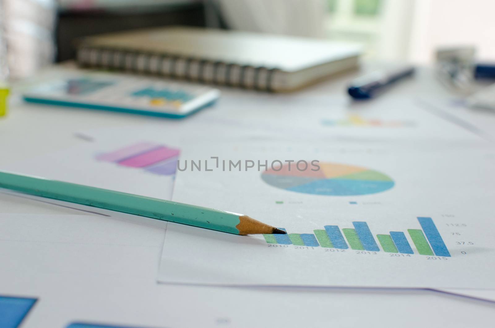 Business of financial analytics desktop with accounting charts and diagrams